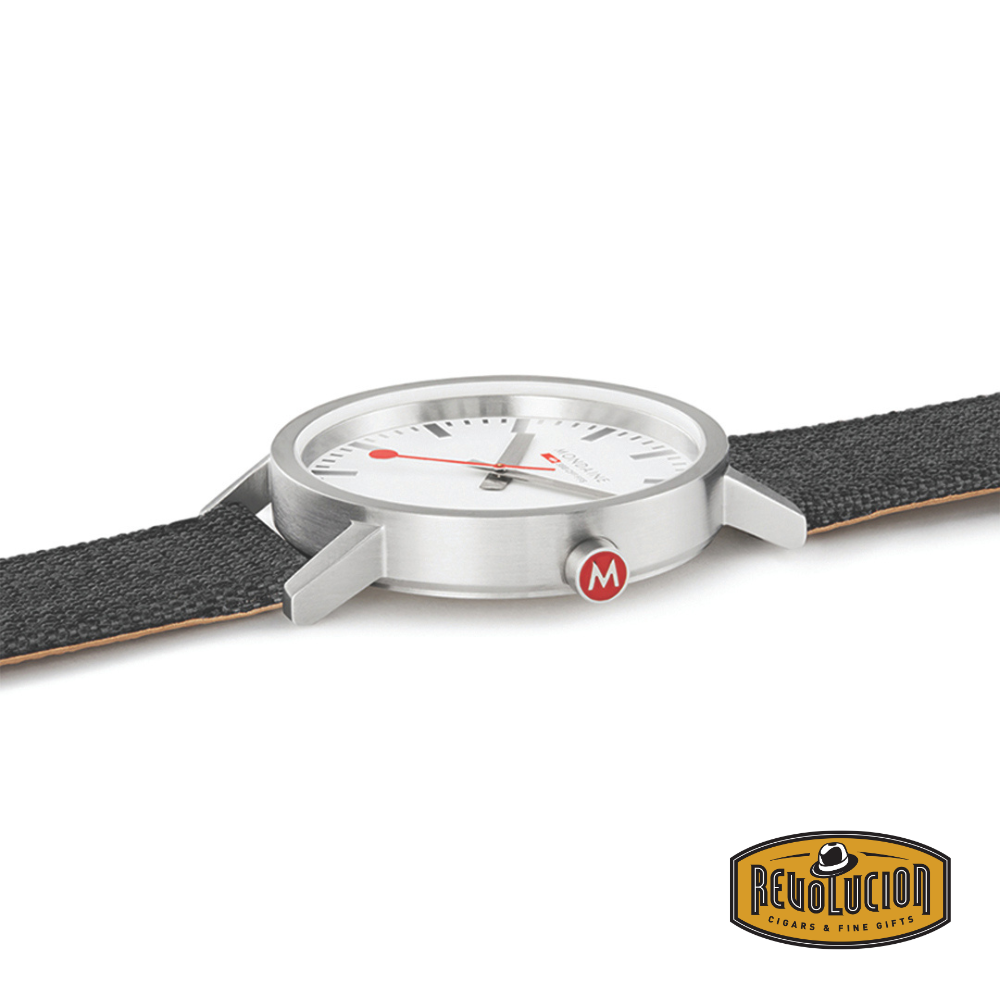 Side view of the Mondaine Classic Gent Watch 40mm, highlighting its slim stainless steel case and the polished crown.