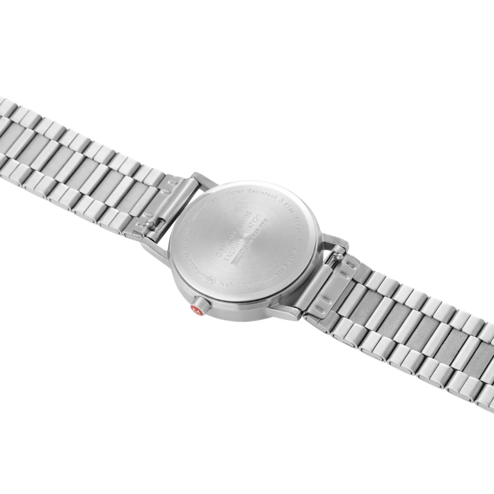 Side view of the Mondaine Classic Silver/White 36mm watch, highlighting its slim profile and stainless steel case.