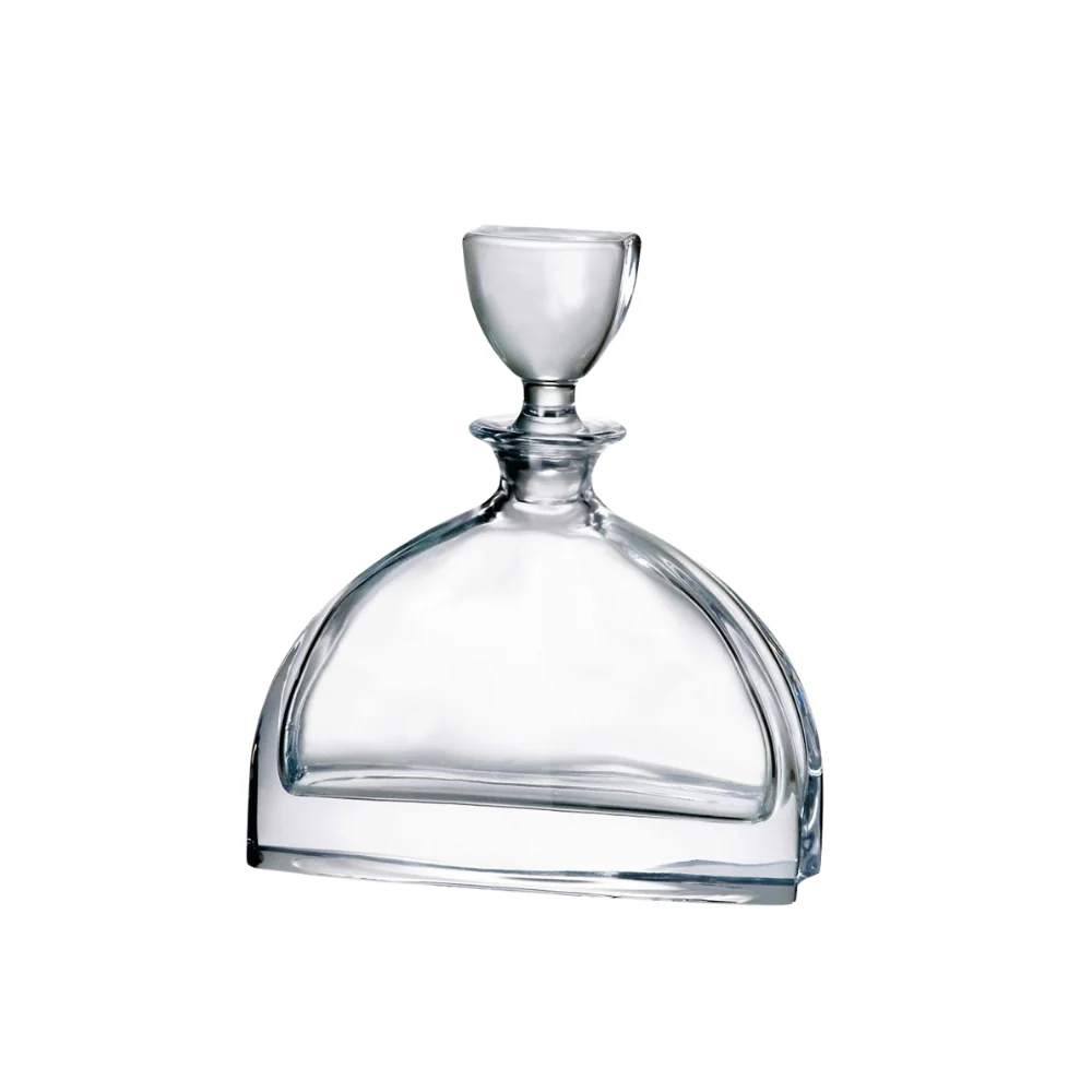 Nemo Decanter 0.7L, a uniquely designed glass decanter with a sculptural, geometric silhouette, perfect for elevating any whiskey or spirits collection.