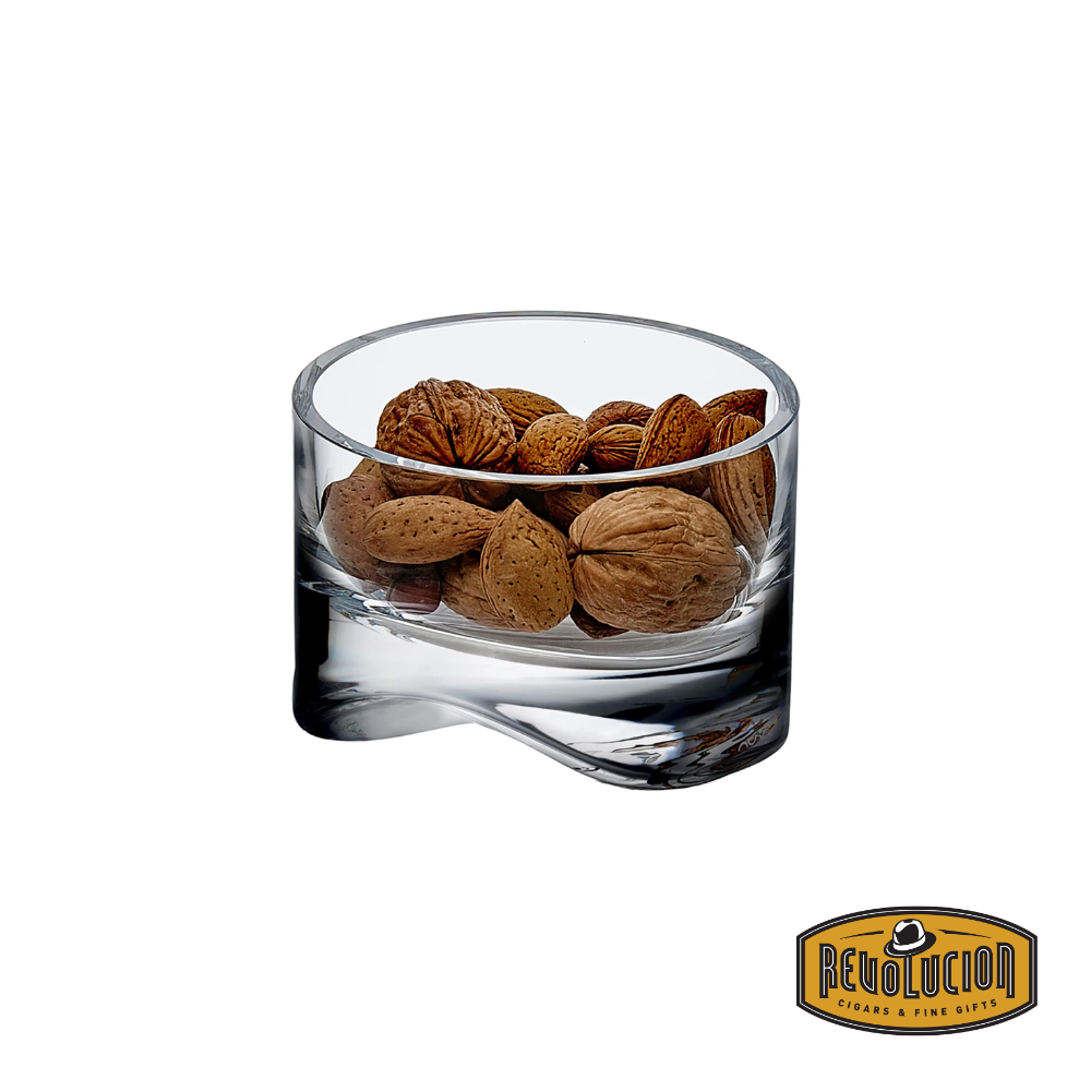 Nude Arch Bowl filled with almonds, showcasing its sleek and modern glass design, perfect for serving snacks with elegance.