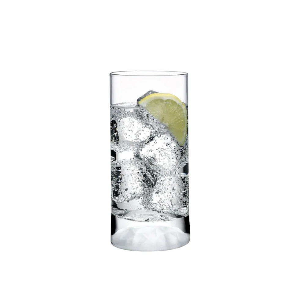 Nude Club Ice Highball Glasses set of 4, filled with sparkling water, highlighting their sophisticated shape and versatility for refreshing beverages.