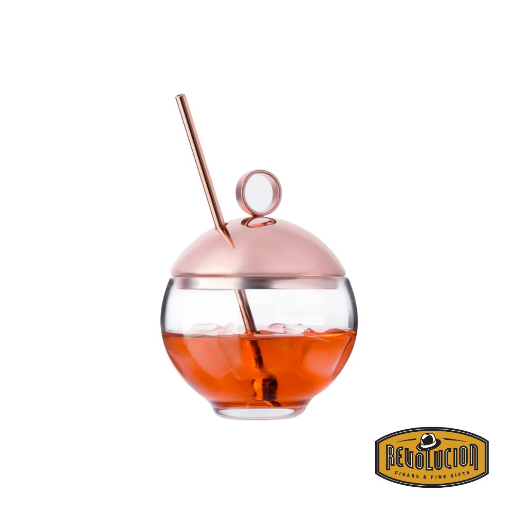 Nude Hepburn Alchemy Glass, filled with liquid, showcasing its sophisticated design and ability to enhance the drinking experience.