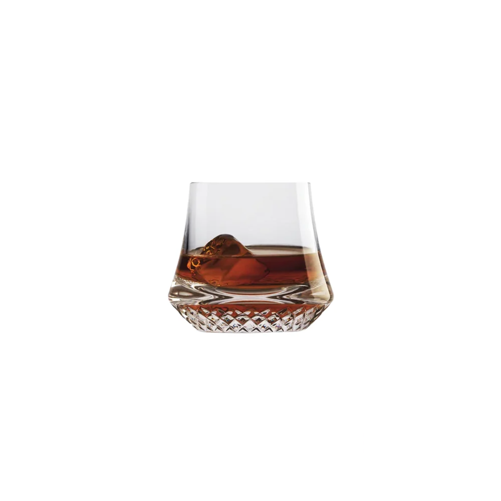 Nude Paris Whisky Glass DOF Set of 2, featuring a sleek and modern design, with one glass filled with whiskey, showcasing its refined aesthetic and perfect craftsmanship.