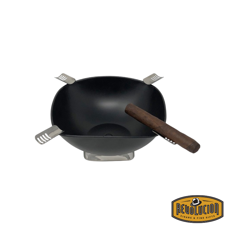 Black Prestige Smokin Ash Quadrangle Ashtray with a cigar resting on its edge, showcasing its elegant and functional design.
