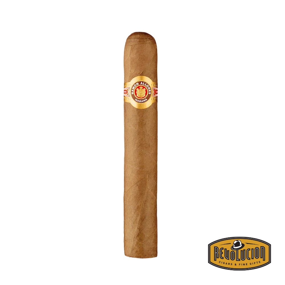 A Ramón Allones No. 3 Cuban cigar standing upright against a white background, featuring its classic band with gold and red details. The Revolución Cigars & Fine Gifts logo is displayed in the bottom right corner.