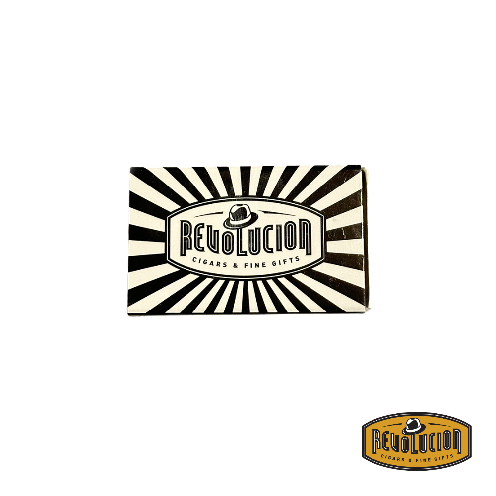 A closed Revolucion matchbox, highlighting its premium branding and design.