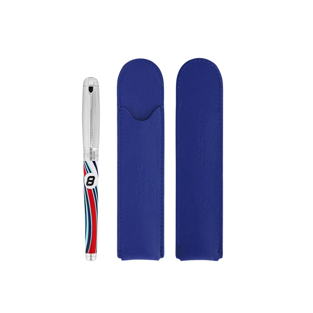 S.T. Dupont x 24H Le Mans Line D Large White Fountain Pen displayed next to two elegant blue leather pen cases, emphasizing its luxury craftsmanship and racing-inspired design.