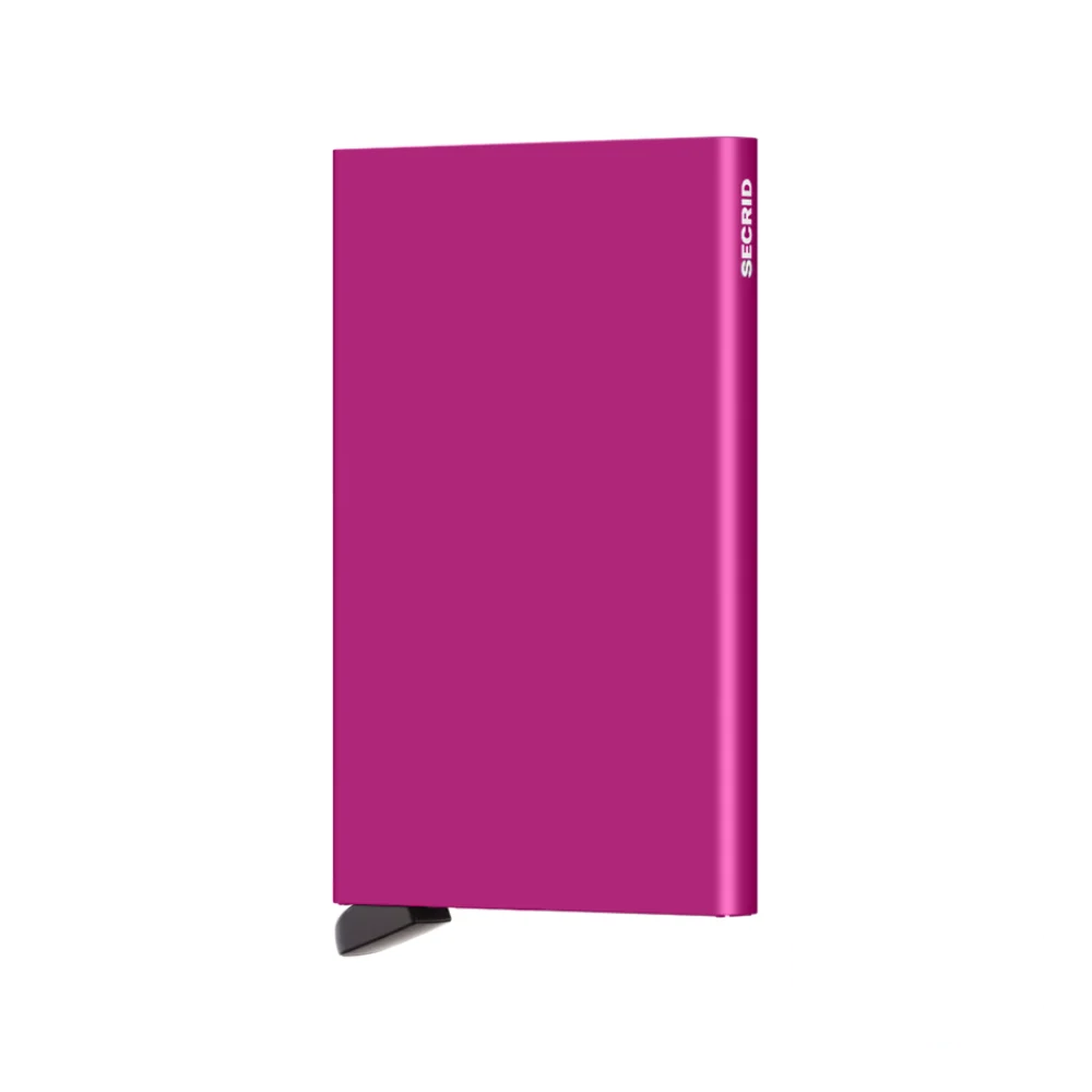 Secrid Aluminium Cardprotector Wallet in striking fuchsia, adding a pop of color while ensuring secure storage for up to six cards.