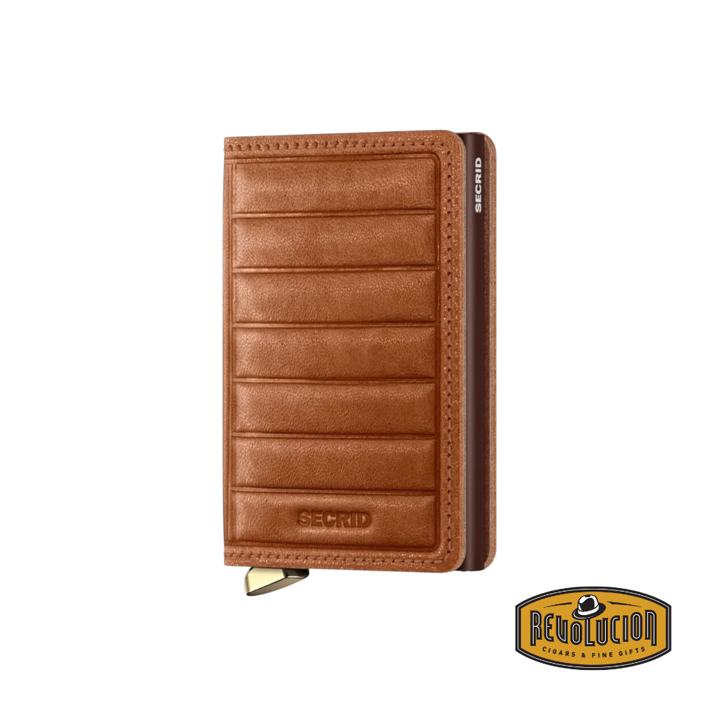 A closed Secrid Premium SlimWallet RFID Emboss Lines Cognac, featuring a rich cognac-colored leather exterior with embossed line detailing for a refined and stylish appearance.
