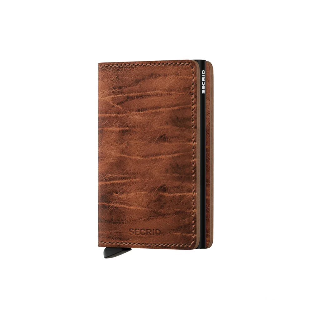 A closed Secrid SlimWallet RFID Dutch Martin Whiskey, showcasing smooth, high-quality Dutch Martin leather in a warm whiskey color, designed for secure and stylish everyday carry.