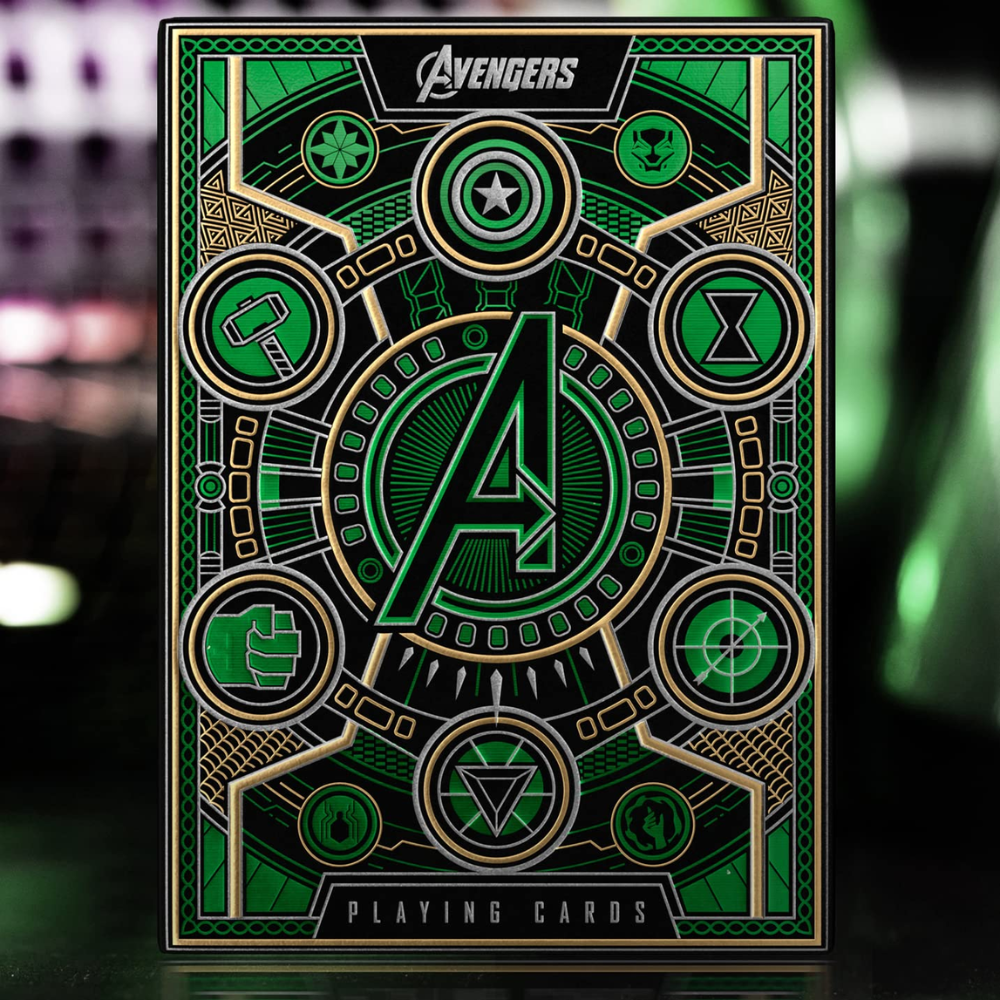 Theory 11 Avengers Green Playing Cards box displayed with a background inspired by the Marvel Avengers universe.