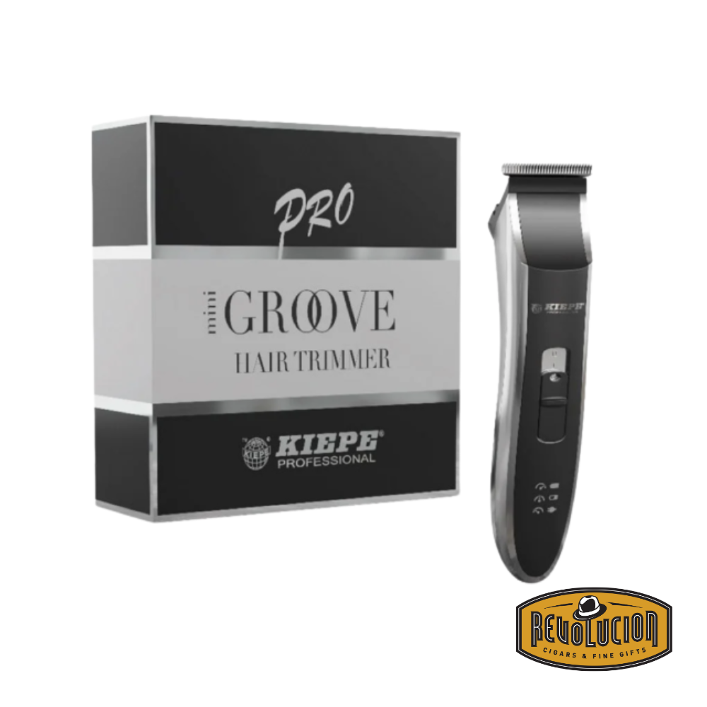 Kiepe Mini Groove trimmer displayed alongside its original retail packaging, highlighting product features and Italian design quality.