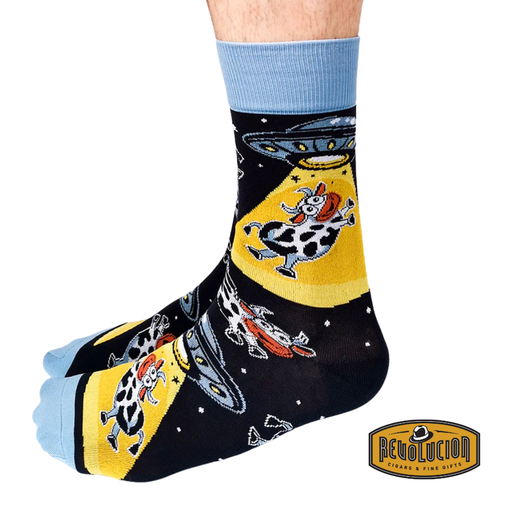 Side view of Uptown Cosmic Cows calf-length cotton unisex socks showcasing playful cows floating in space, adding a quirky and fun touch to your outfit.