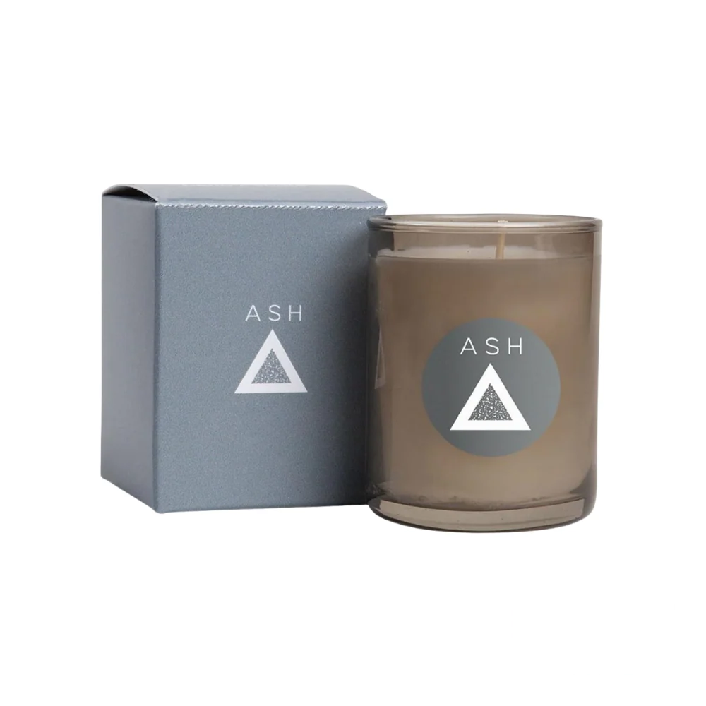 Volcanic Ash Candle 3oz in a compact, dark-toned container with a minimalist label design.