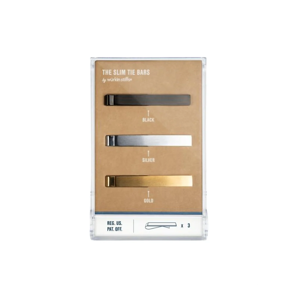 A premium Wurkin Tie Bars set displayed in a sleek box, featuring three elegant tie bars in black, silver, and gold, crafted for a secure and sophisticated touch to any outfit.