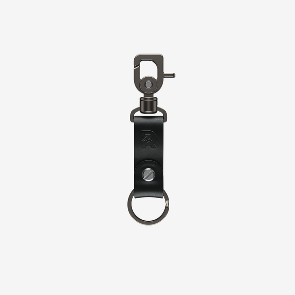 The Ridge Aluminium and Leather Keychain. Natural brown with  The Ridge logo stamp embossed. 