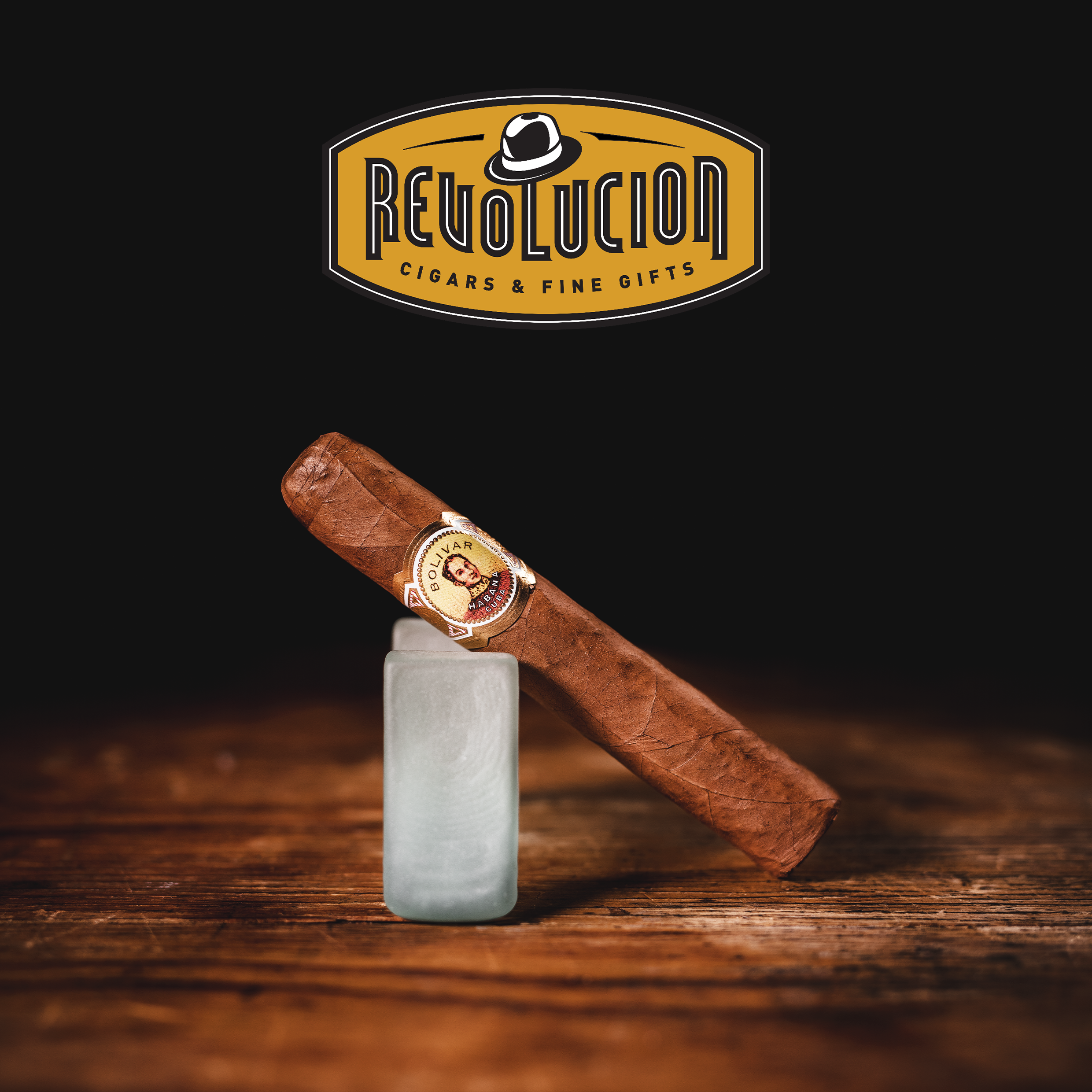 Bolivar Royal Corona Cuban cigar resting on a sleek cigar stand, showcasing its rich brown wrapper and signature band.