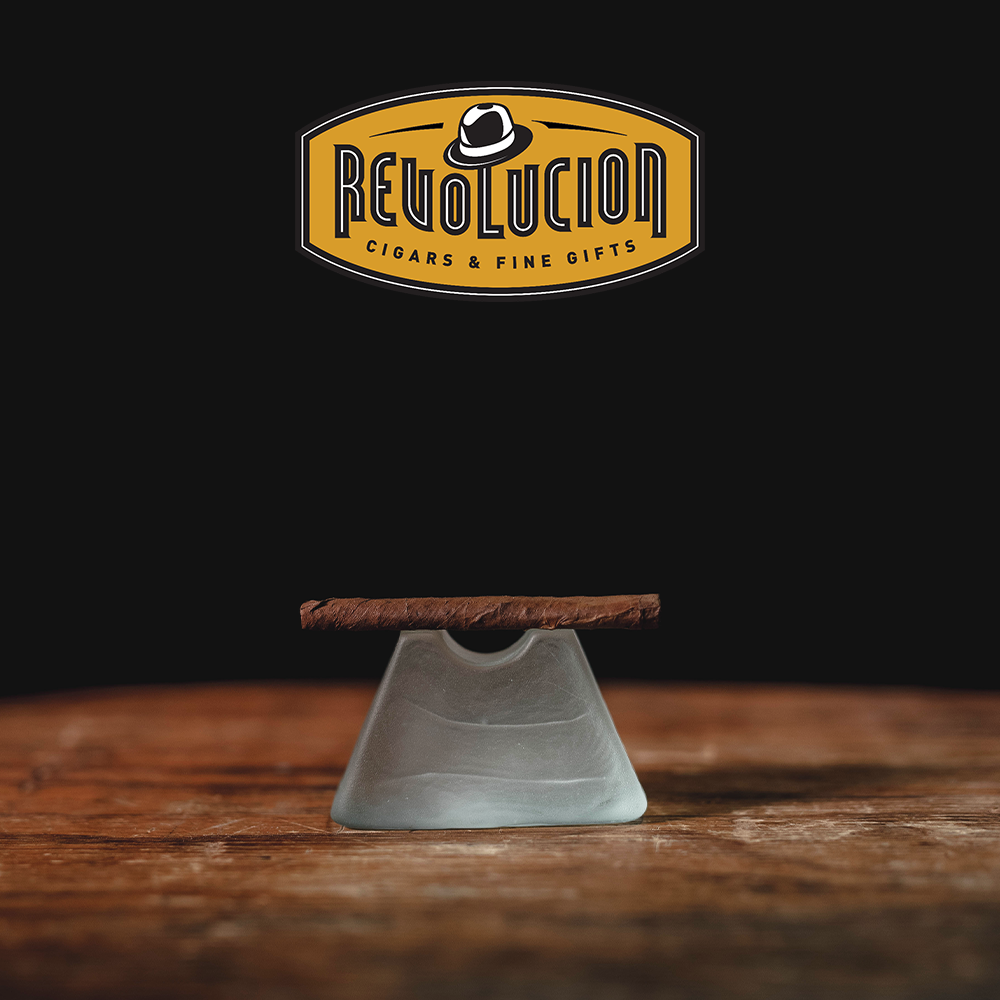 Side view of a Montecristo Mini Mild-Medium Strength Cuban Cigarillo, displaying its compact and smooth finish.