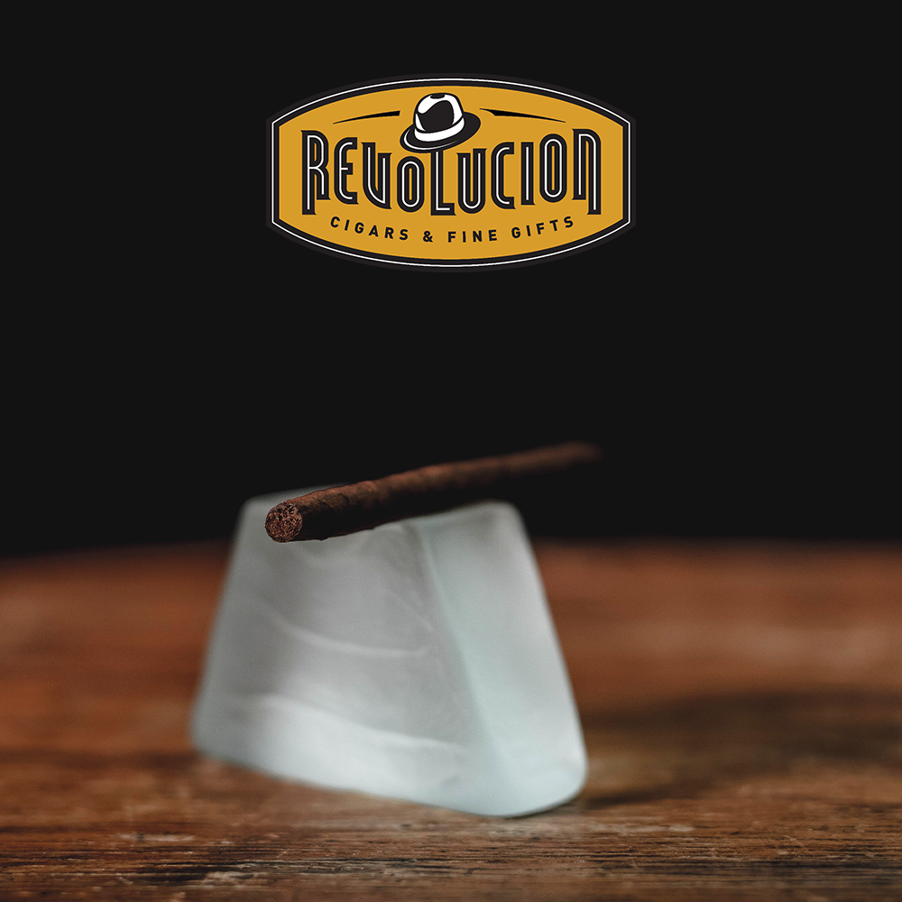 Close-up of the foot of a Partagas Mini Full-Strength Cuban Cigarillo, emphasizing the high-quality Cuban tobacco.