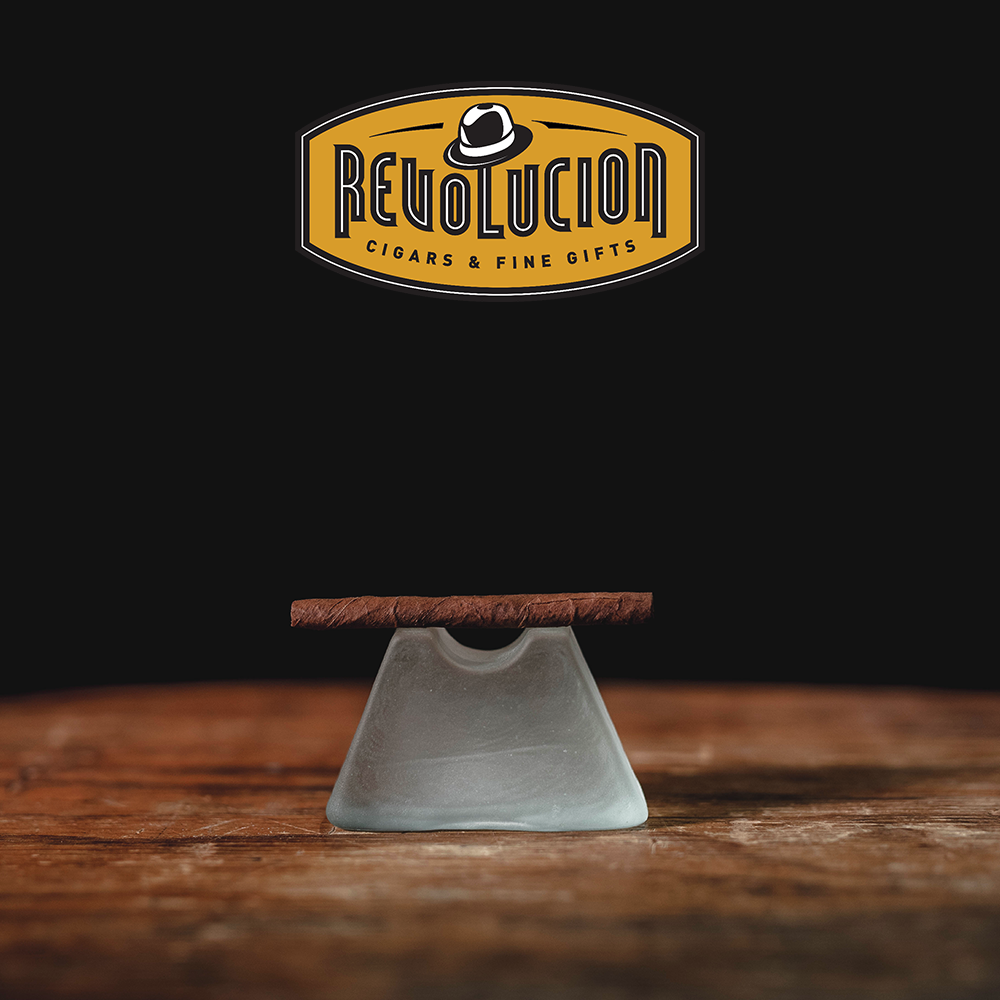 Side profile of a Partagas Mini Full-Strength Cuban Cigarillo, showcasing its smooth wrapper and expert craftsmanship.