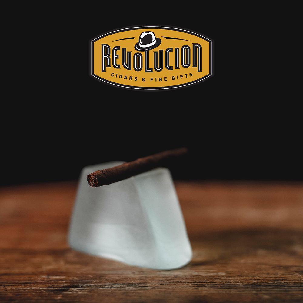 A detailed foot view of a Partagás Series Mini Cuban cigarillo, showcasing the tightly packed tobacco.