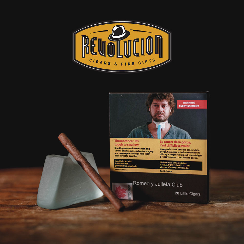 A simple, plain packaging box containing the cigarillos, offering a clean and minimalistic presentation.