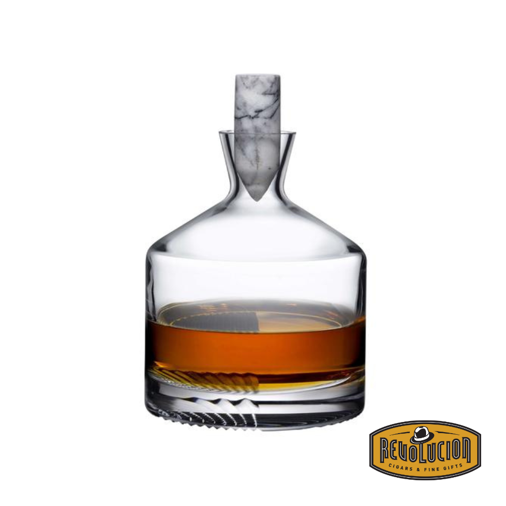 Elegant whiskey carafe with a sleek, modern design, featuring a marble stopper and a partially filled glass base showcasing its refined craftsmanship. Includes the Revolucion Cigars & Fine Gifts logo.