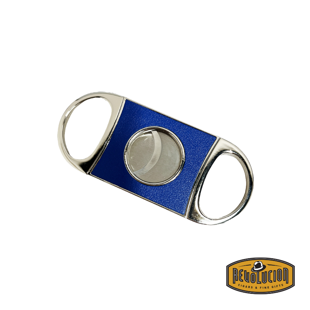 Brizard & Co. Double Guillotine II Cigar Cutter in bleached oak, displayed next to its royal blue leather case, showcasing a refined and premium aesthetic.