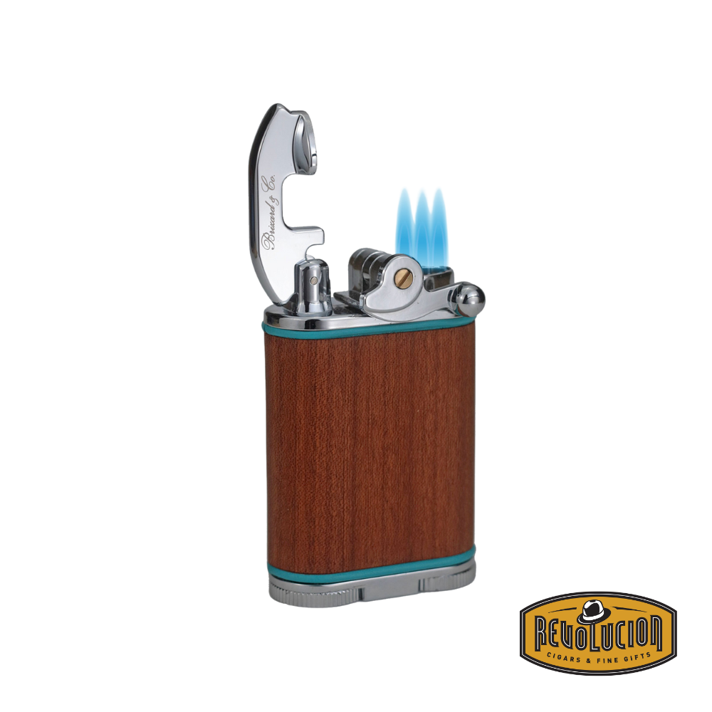 Brizard & Co Gatsby Table Lighter ignited, revealing its triple-jet flame and high-end craftsmanship.