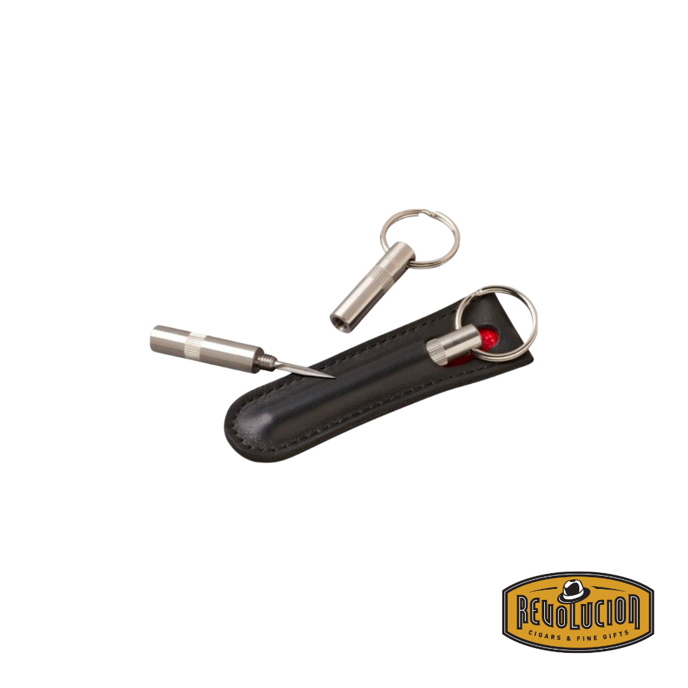 Brizard & Co. Trilogy Spear Punch - Dakota Black with red accents, elegantly placed in its matching leather case, showcasing its sleek and premium design.