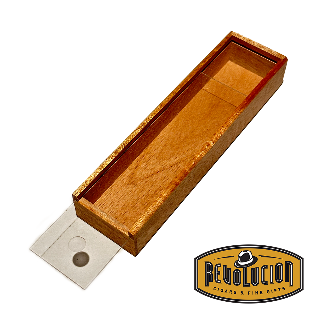 Top view of an open wooden cigar gift box with a rectangular shape, showing its empty interior and a small circular compartment at one end for holding cigars securely