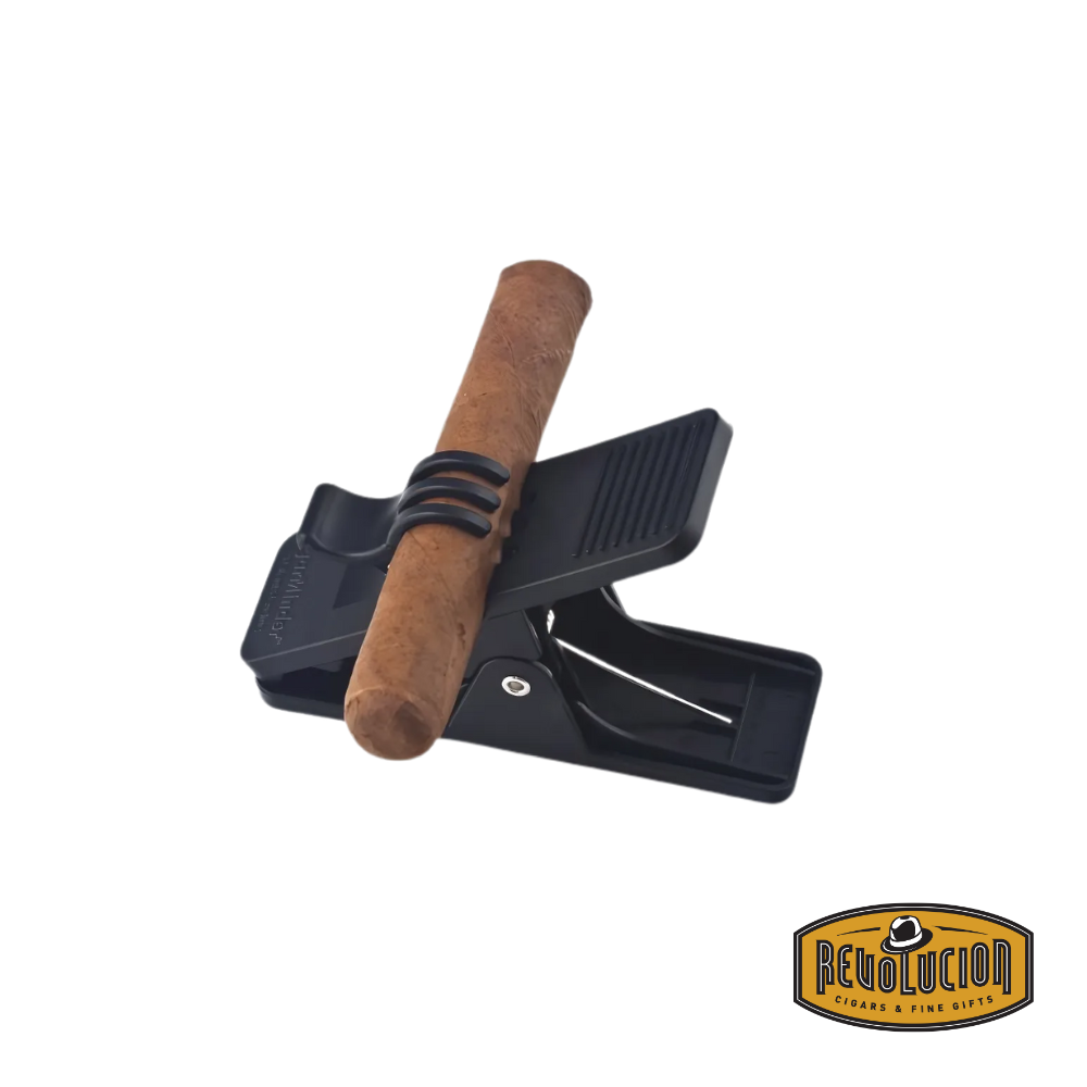 Cigar Minder Clip Holder in black color, designed to securely hold a cigar while golfing, driving, or relaxing, with a durable clamp and flexible grip.
