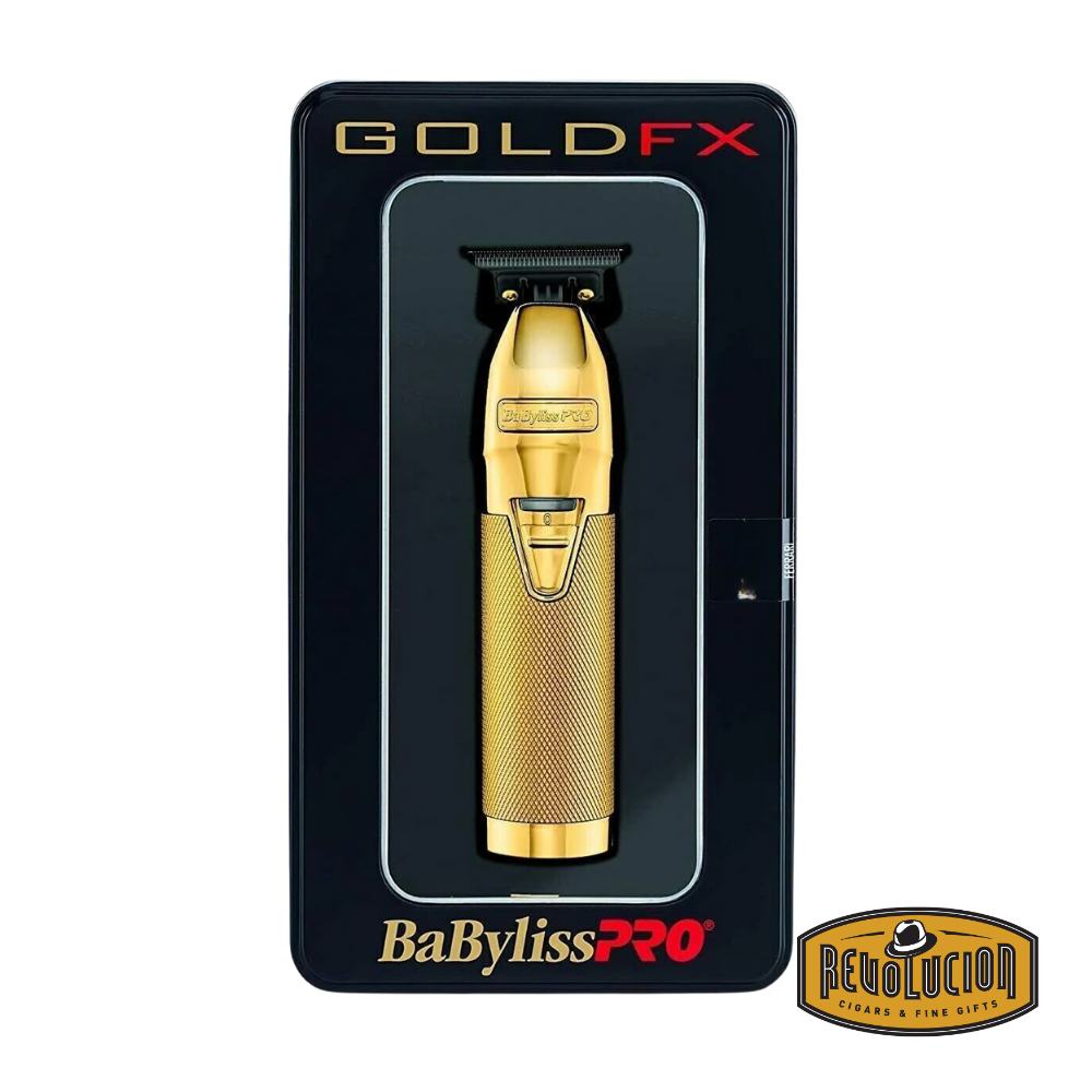 Retail box of the Babyliss Pro Foil FX Gold, featuring gold and black branding with product imagery and technical details.