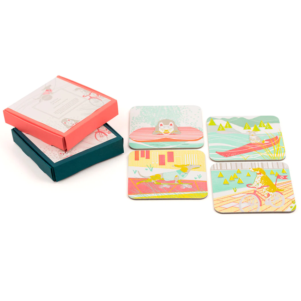 Set of 4 "dog days of summer" coasters in abstract print of varying scenes. Available at Revolucion lifestyle, premium gifts and more in Vancouver, BC - and available online. 