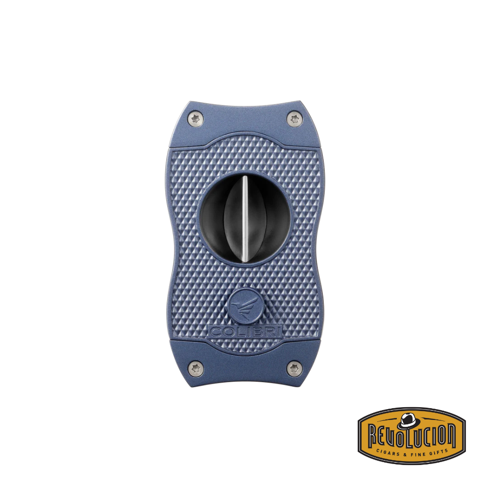 A refined navy blue Colibri Diamond V-Cut Cigar Cutter showcasing a diamond-textured grip and razor-sharp V-cut blade for a clean cigar cut.
