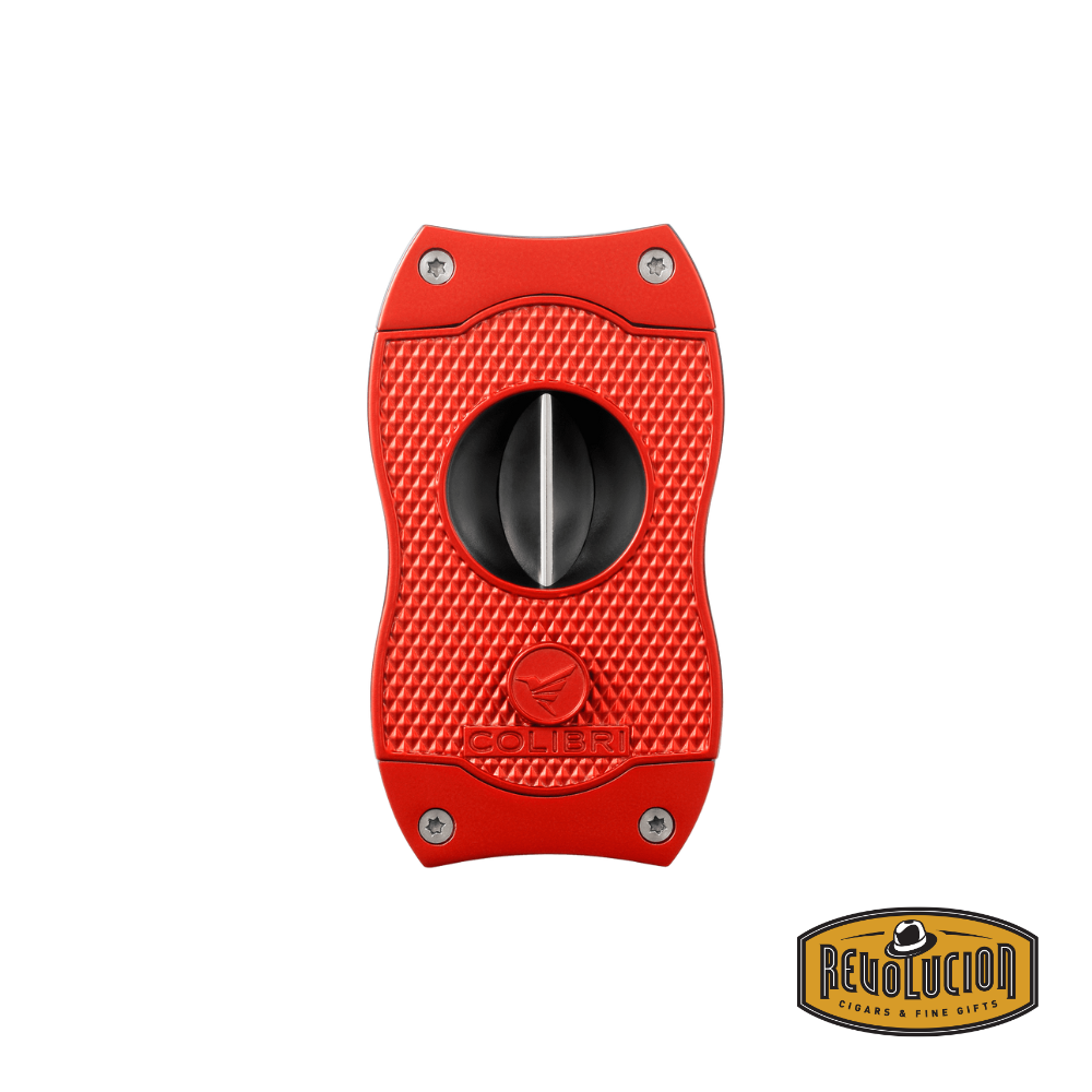 A bold red Colibri Diamond V-Cut Cigar Cutter with a precise stainless-steel V-cut blade and ergonomic design for smooth operation.