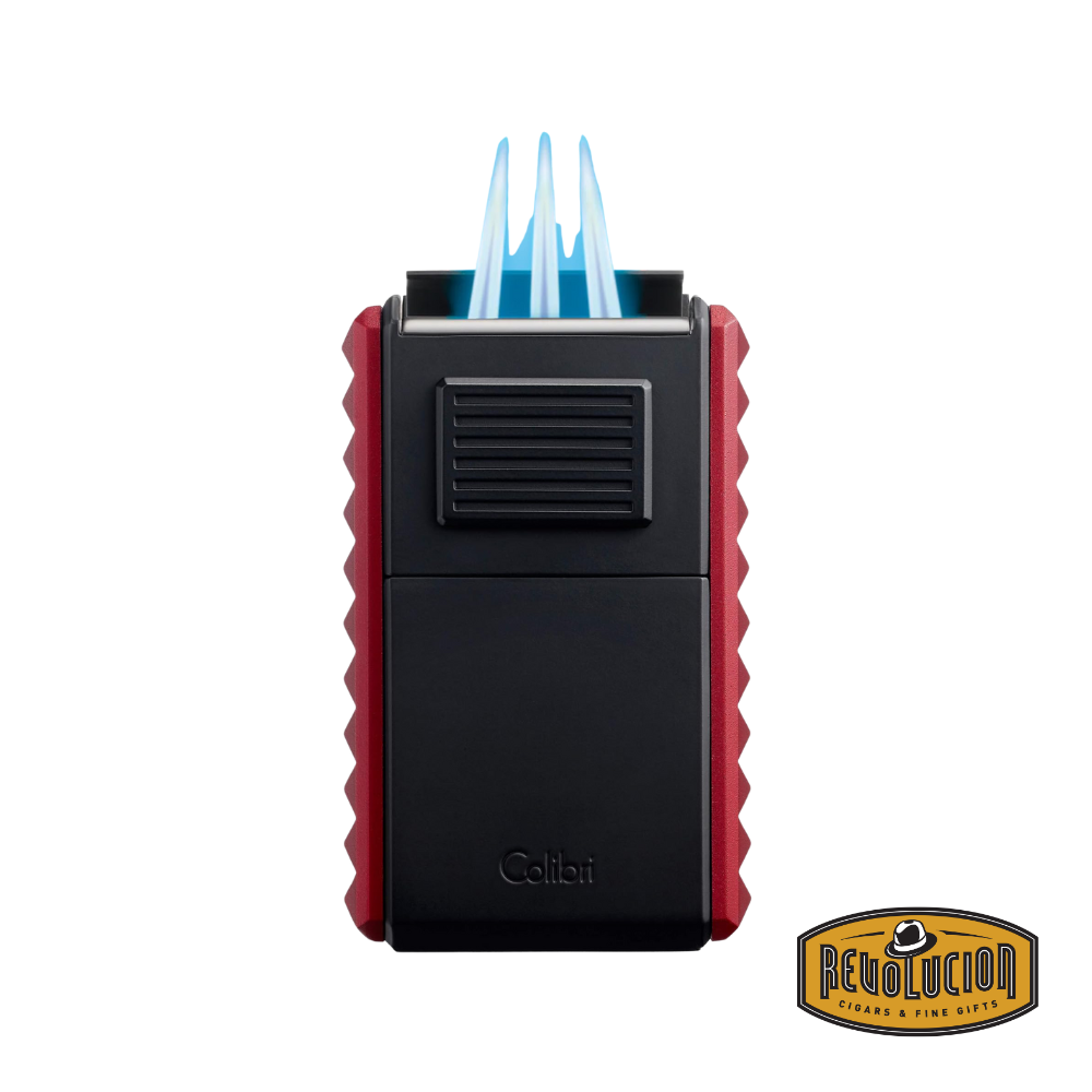 Colibri Quasar Astoria Triple-Jet Lighter in Red, displayed with its triple torch flames ignited for precision lighting.