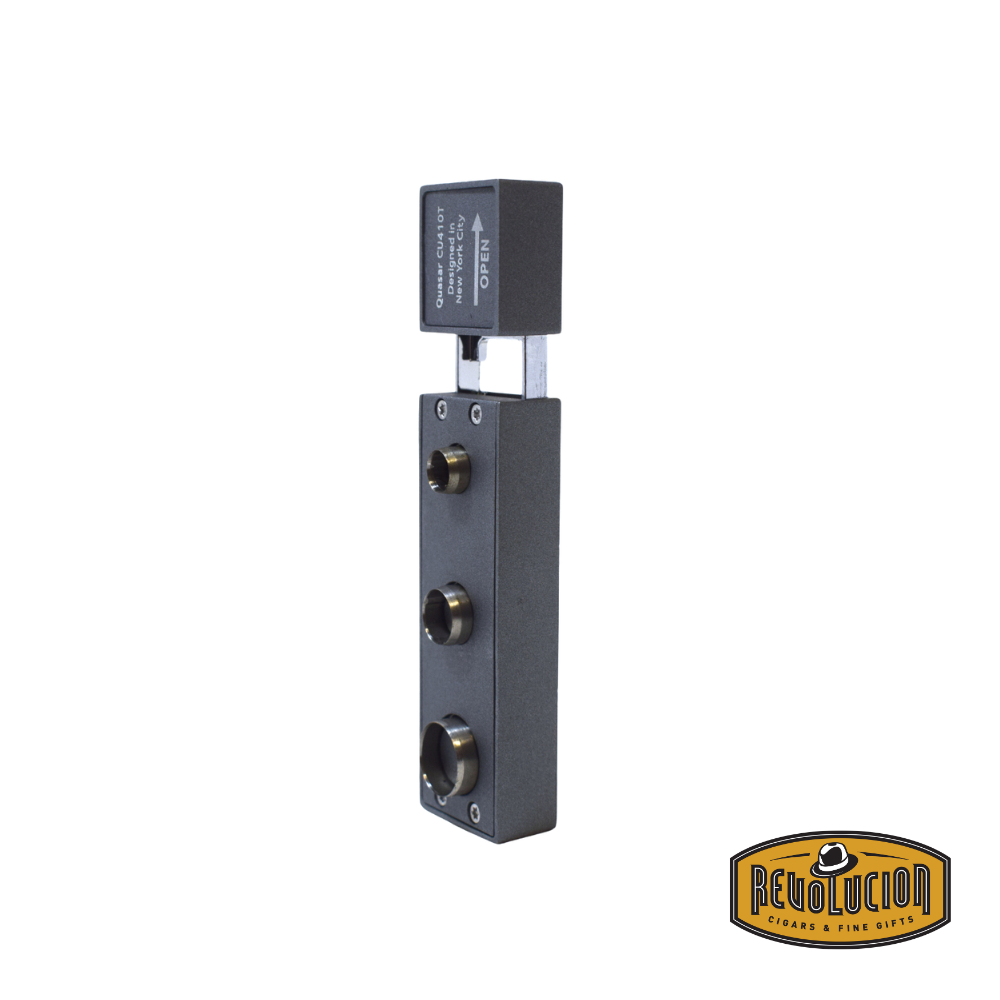 The Colibri Quasar Punch cigar cutter in charcoal, displayed with three extended punch blades, offering versatile cutting options for cigars.
