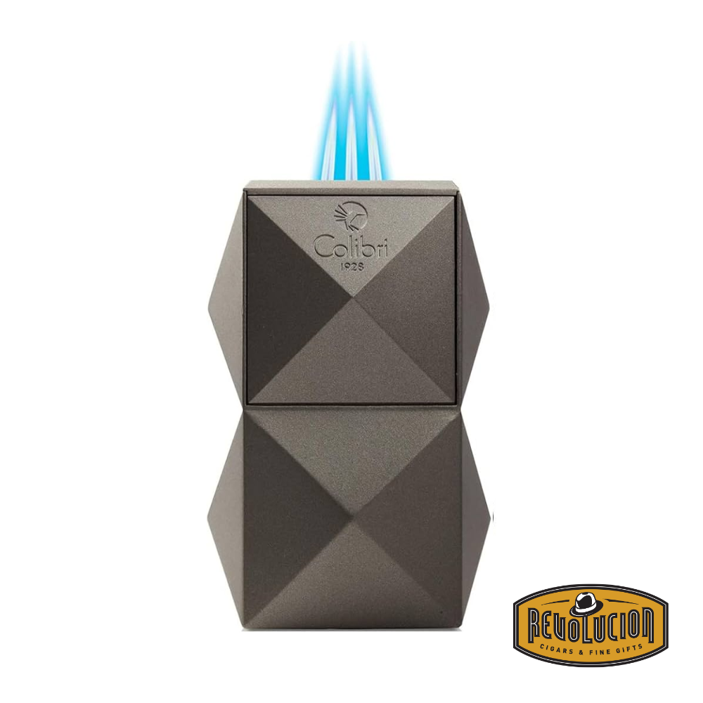 Colibri Quasar Triple Flame Table Lighter in Gunmetal, showing three powerful flames ignited.
