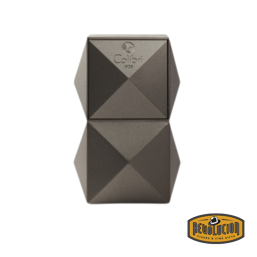 Colibri Quasar Triple Flame Table Lighter in Gunmetal with a sleek geometric design.