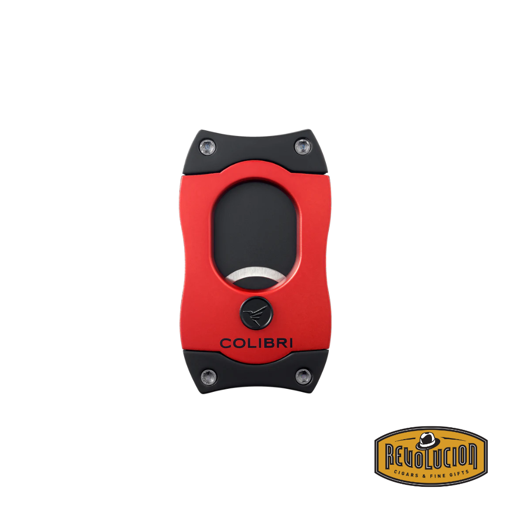 A stylish red and black Colibri S-Cut cigar cutter with a modern ergonomic design and a durable, high-quality finish.