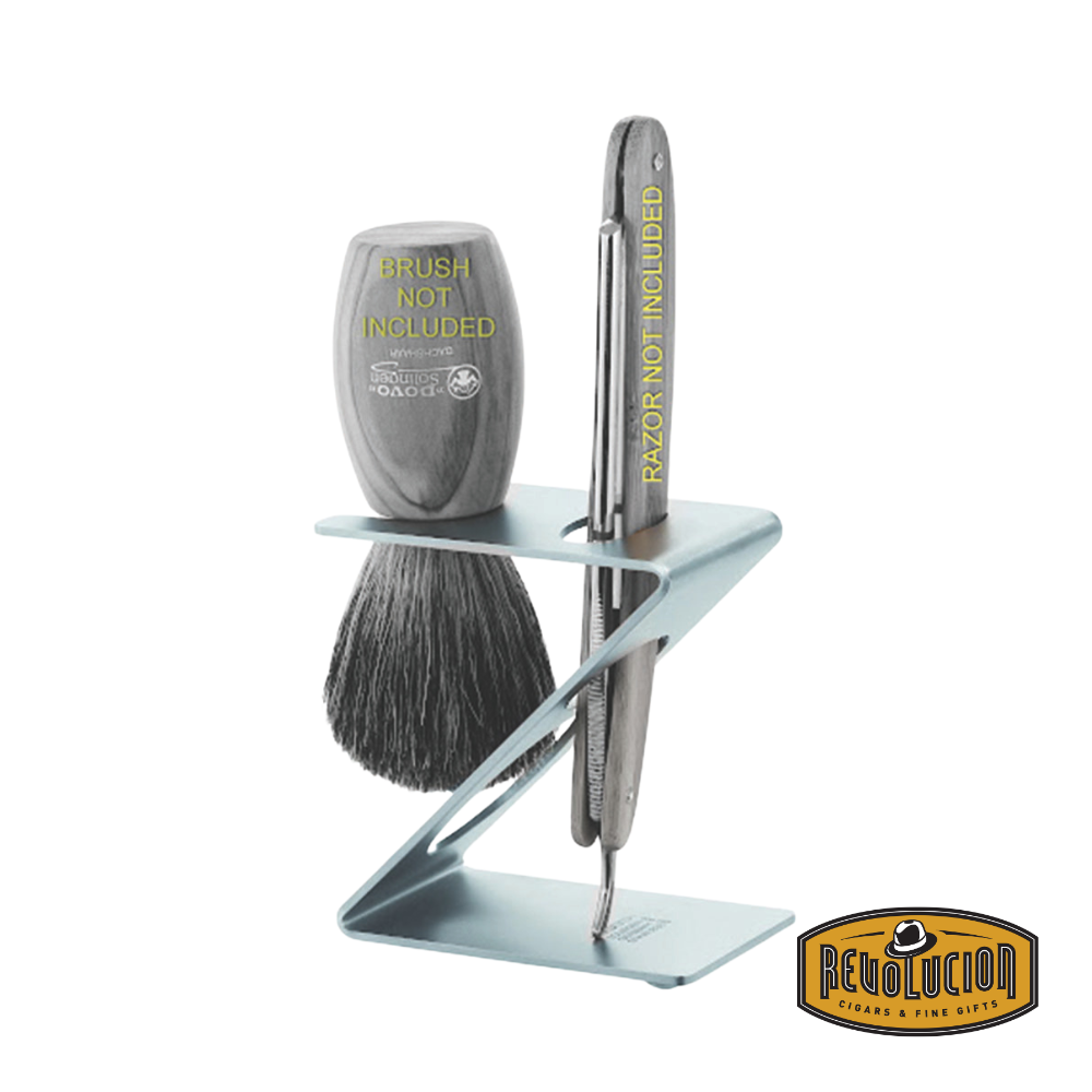 Dovo Stand holding a brush and straight razor – elegant chrome-finished grooming stand displaying a shaving brush and straight razor in perfect harmony.