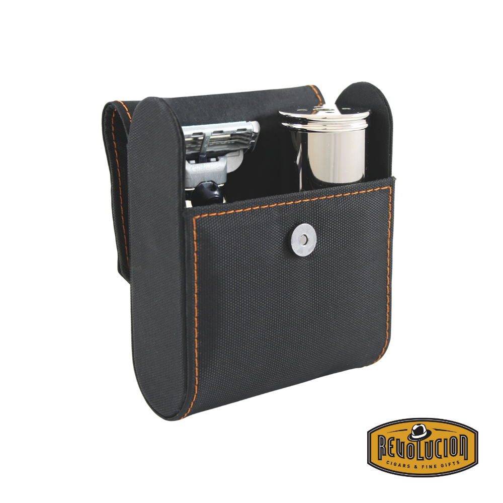 Opened leather case showing the Edwin Jagger Mach3 razor and accessories neatly organized inside.