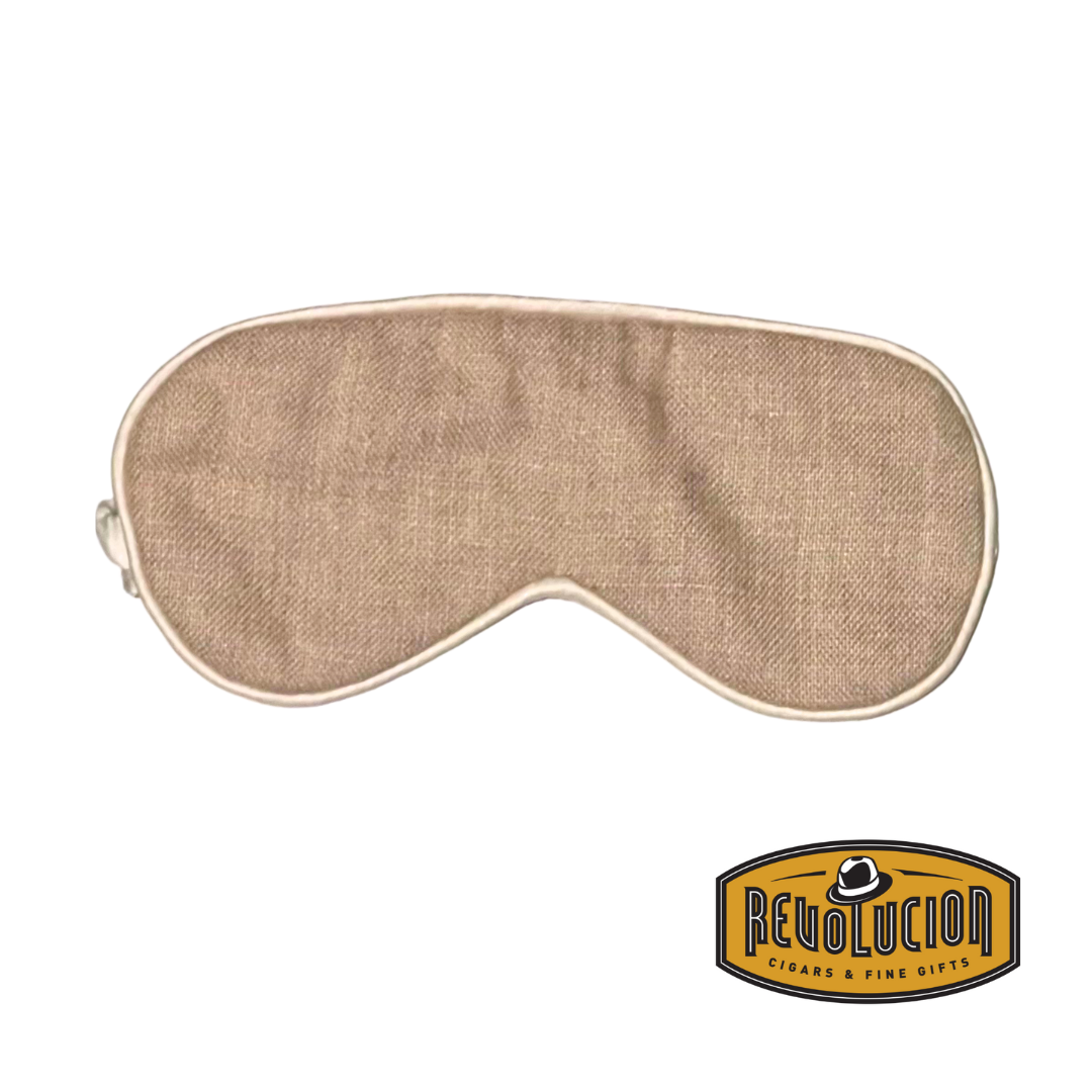 A cream beige sleep mask with a delicate lace elastic band, offering a secure and comfortable fit. The soft fabric enhances relaxation and promotes better sleep.