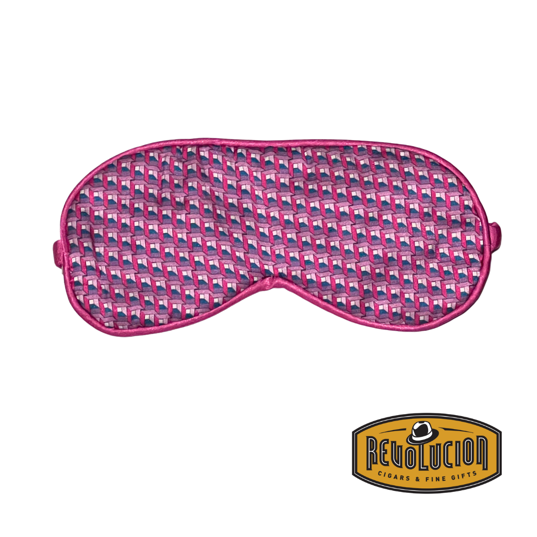 A soft pink sleep mask featuring a delicate lace elastic band for a secure and comfortable fit. Designed to enhance relaxation and block out light effectively.