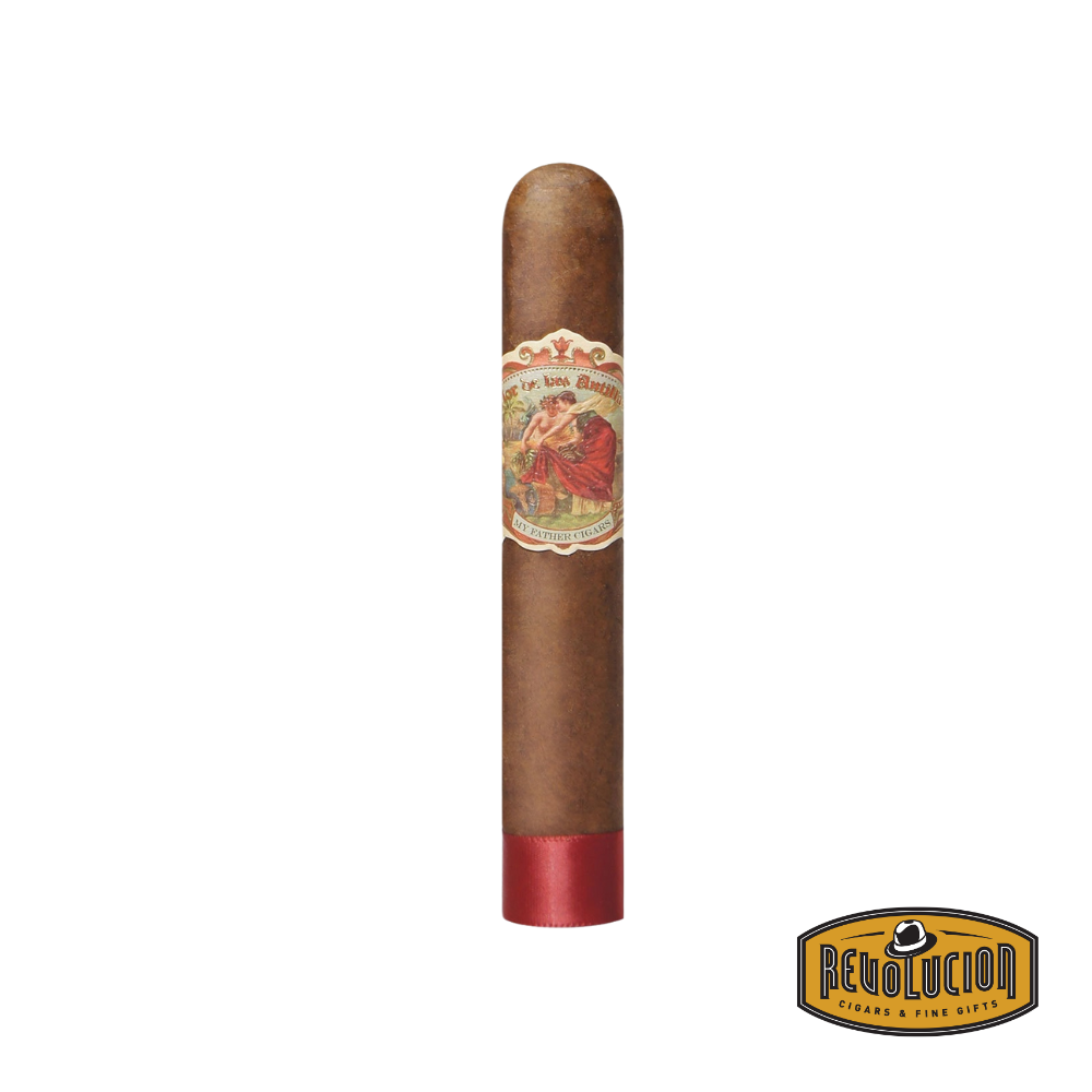 Flor de Las Antillas Robusto cigar with a classic Cuban-style band, lying on a rustic wooden surface.