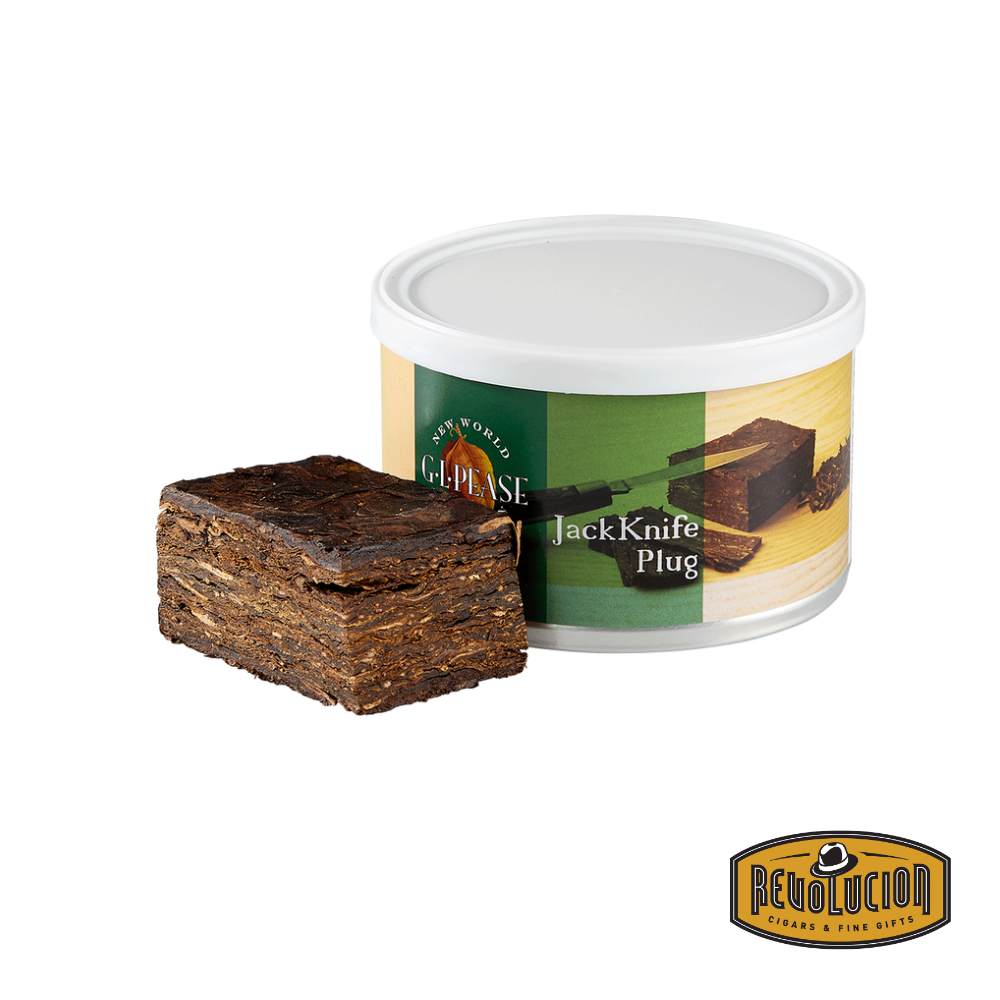 Image of a tin of GL Pease Jackknife Plug Pipe Tobacco. The packaging has a rugged and classic design, with branding and an artistic label. The Revolucion logo is visible in the corner.