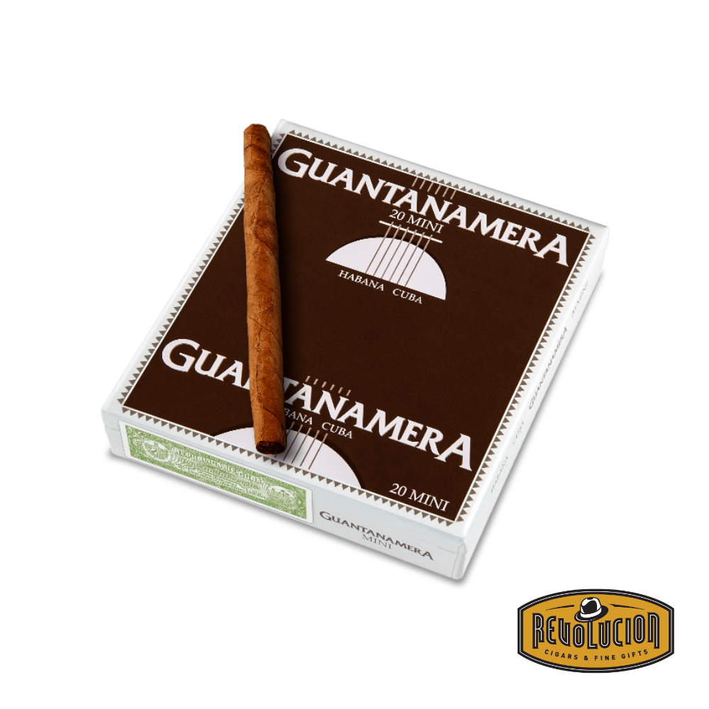 Guantanamera Mini Cuban Cigarillos in an open box showcasing mild-strength mini cigarillos, with one placed outside the box for clear visibility.