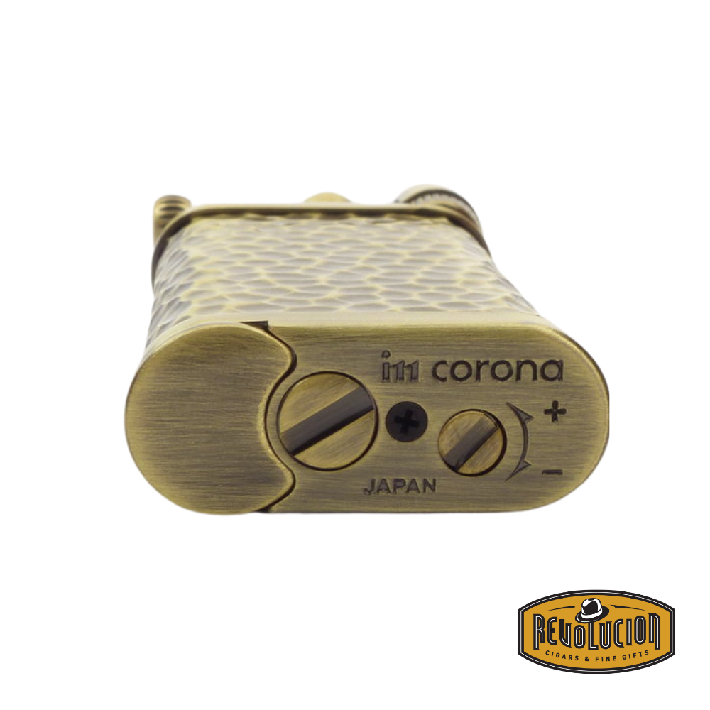 Bottom of the IM Corona Old Boy 2217 Pipe Lighter showing the refill port and flame adjustment mechanism.