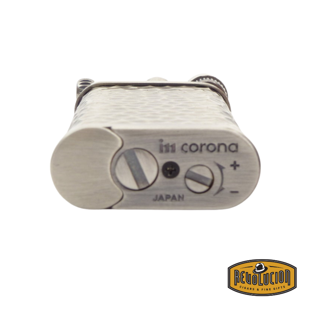 Base of the IM Corona Old Boy 7717 Pipe Lighter with refill valve and flame adjustment knob clearly visible.